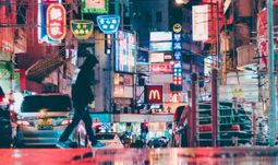 Hong Kong bankers living in "frat houses" as families leave