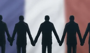 French bankers holding hands in front of flag