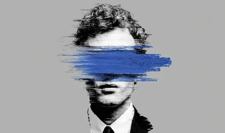 A man with a blue stripe across his face