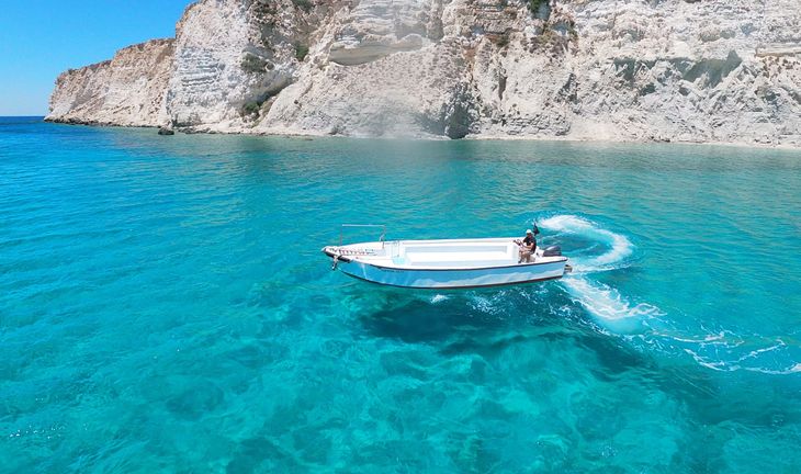 a boat on blue seas