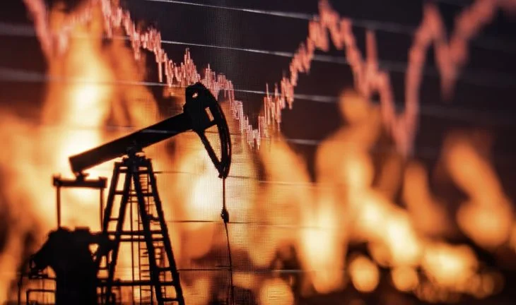 an oil pump superimposed on a graph and flames 